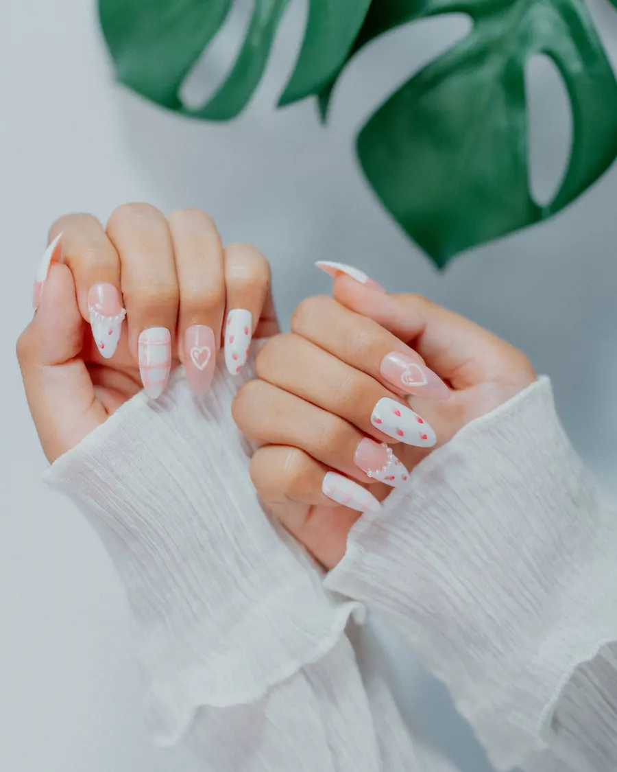 White set with pink heart nail art